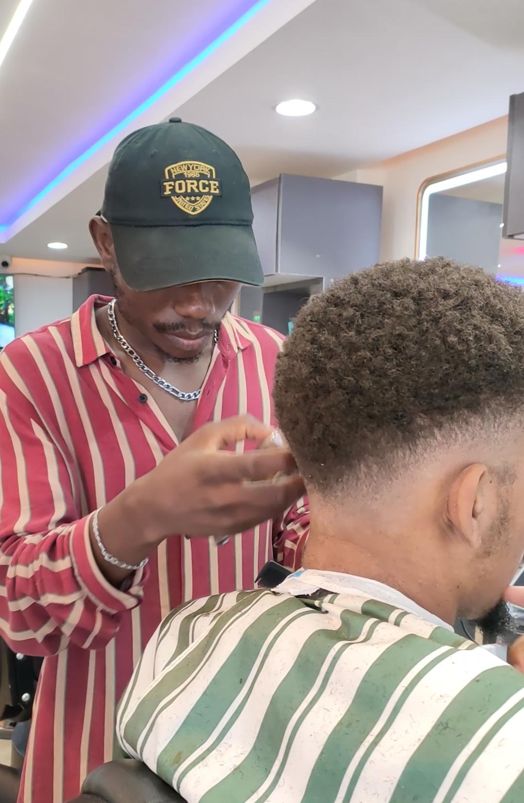 Fade haircut service at Maimo Mancave